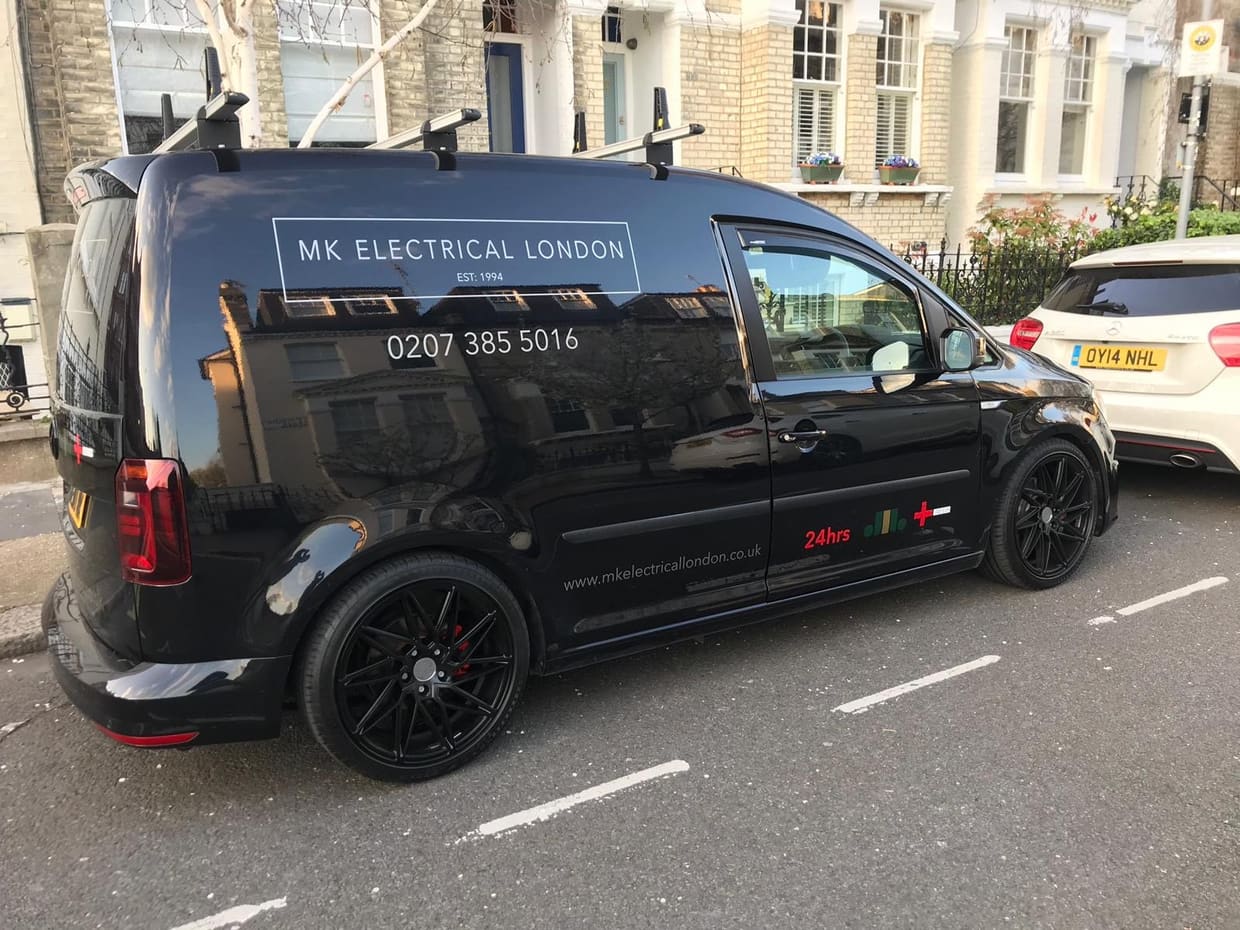 The liveried MK Electrical London van — 0207 385 5016, 24hrs — on a Fulham street